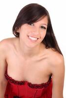 Smiling portrait young woman in red corset photo