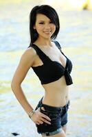 Asian American Woman Outdoors Shorts and Top photo