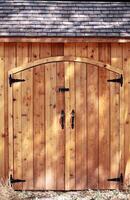 Tight shot closed doors cedar wood shed photo