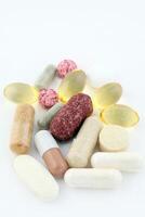 Group of vitamin pills food supplements photo