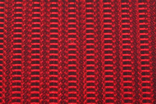 closeup of red bicycle reflector columns and rows photo