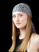 Young caucasian woma in head scarf with green eyes photo