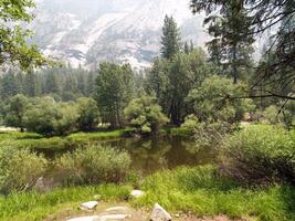 pond in high sierra valley yosemite park photo