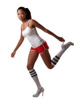 Young African American woman shorts and heels photo