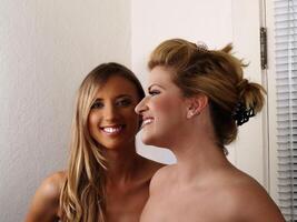 Two Smiling Blond Women Bare Shoulders Friends photo