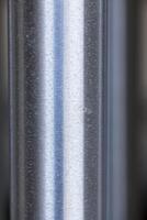 Aluminum Metal Tube Chime Closeup Indistinct Background photo