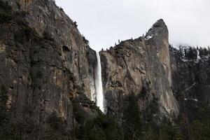 Waterfall And Rock Wall Yosemite National Park California photo