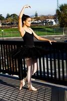 Young Slim African American Woman In Dance Outfit Outdoors photo