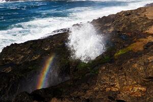 Rainbow In Mist From Lava Tube Spray Newport Oregon photo