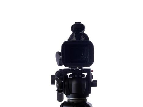 Video camera mounted on tripod facing viewer photo