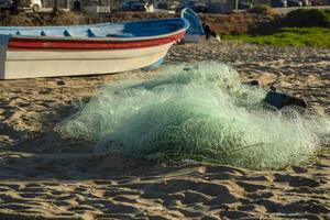 fishing net in punta lobos beach, baja california sur mexico photo