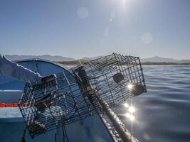 fishing with lobster pot in mexico photo