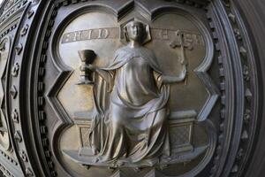 golden door of battistero of Giotto detail near Cathedral Santa Maria dei Fiori, Brunelleschi Dome Italy photo