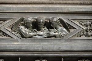 Florence Cathedral Santa Maria dei Fiori Italy - detail of sculpture of door photo