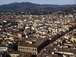 Florence Aerial view cityscape from giotto tower detail near Cathedral Santa Maria dei Fiori, Brunelleschi Dome Italy photo