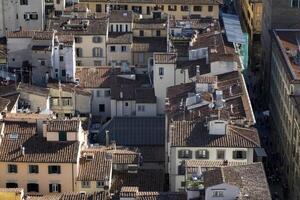 Florence Aerial view cityscape from giotto tower detail near Cathedral Santa Maria dei Fiori, Brunelleschi Dome Italy photo