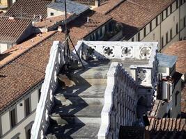 Florence Aerial view cityscape from giotto tower detail near Cathedral Santa Maria dei Fiori, Brunelleschi Dome Italy photo