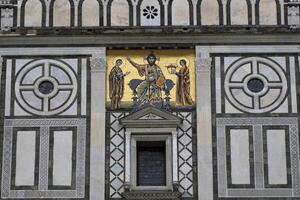 Detail of facade of church San Miniato al Monte in Florence photo