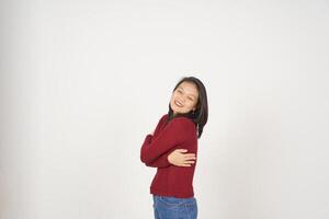 Young Asian woman in Red t-shirt Hug herself, Self love concept isolated on white background photo