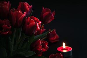 AI generated Red flowers and candle on dark background, creating a stunning contrast photo