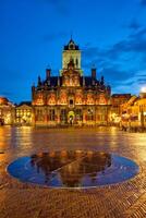 Delft Market Square Markt in the evening. Delft, Netherlands photo