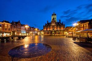 Delft Market Square Markt in the evening. Delfth, Netherlands photo
