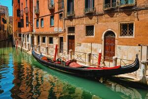 Narrow canal with gondola in Venice, Italy photo