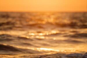 Ocean on sunset background photo