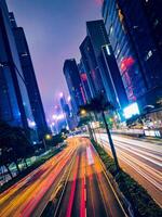 Street traffic in Hong Kong at night photo