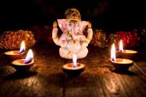 Ganesha with Diwali lights photo