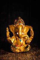 Ganesha statue on white photo