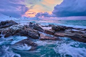 Norwegian Sea waves on rocky coast of Lofoten islands, Norway photo