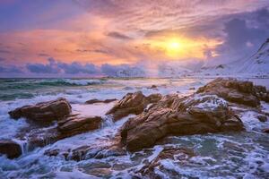 Norwegian Sea waves on rocky coast of Lofoten islands, Norway photo