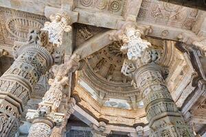 Columns of beautiful Ranakpur Jain temple in Ranakpur, Rajasthan. India photo