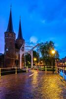 Oostport Eastern Gate of Delft at night. Delft, Netherlands photo