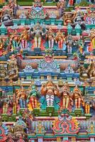 Sculptures on Hindu temple tower photo