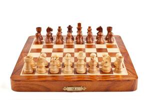 Chess on chessboard photo