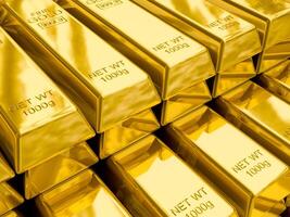 Stacks of gold bars close up photo