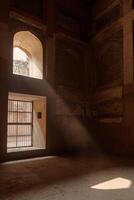 Ray of sun coming through window in Agra fort photo