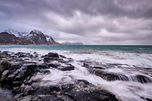 Rocky coast of fjord in Norway photo