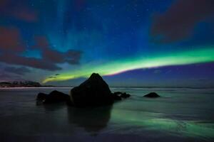 Aurora borealis northern lights. Lofoten islands, Norway photo
