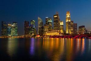 Singapore skyline in evening photo