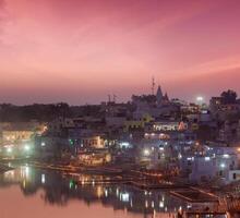 Sacred Puskhar lake  Sagar and ghats of town Pushkar in twilig photo