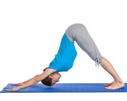 Yoga - young beautiful woman doing yoga asana exercise isolated photo
