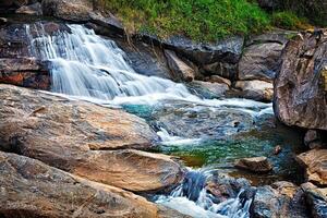 Small tropical waterfall photo