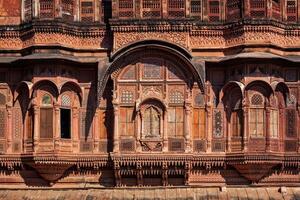 Decorated carved windows in Rajasthan, India photo