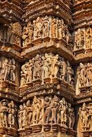 Famous sculptures of Khajuraho temples, India photo