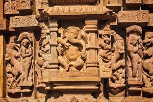 Famous sculptures of Khajuraho temples, India photo