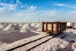 Rail road with railcart cart at salt mine at Sambhar Lake photo