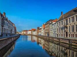 Canal and old houses, Bruges photo